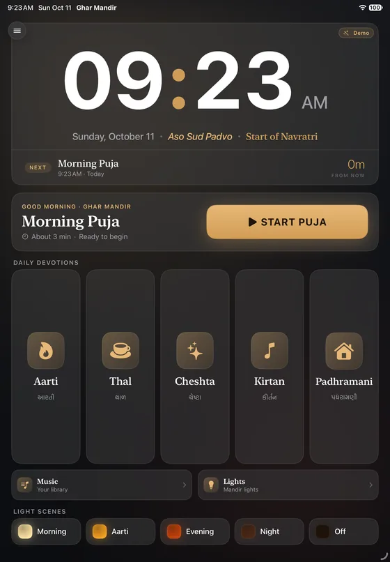 Ghar Mandir on iPad in dark theme with a Demo badge: a large 9:23 AM clock above ‘Sunday, October 11 · Aso Sud Padvo · Start of Navratri’, Morning Puja listed as next, a Start Puja button, five Daily Devotions tiles (Aarti, Thal, Cheshta, Kirtan, Padhramani) with Gujarati labels, and Light Scenes chips.