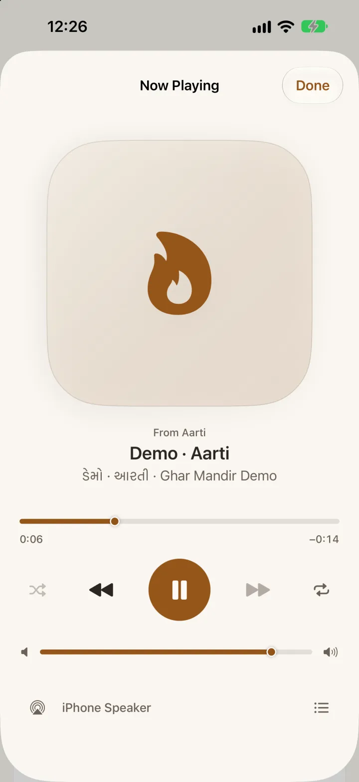 Ghar Mandir's player on iPhone: an Aarti playing, with shuffle, previous, pause, next, repeat, volume and AirPlay